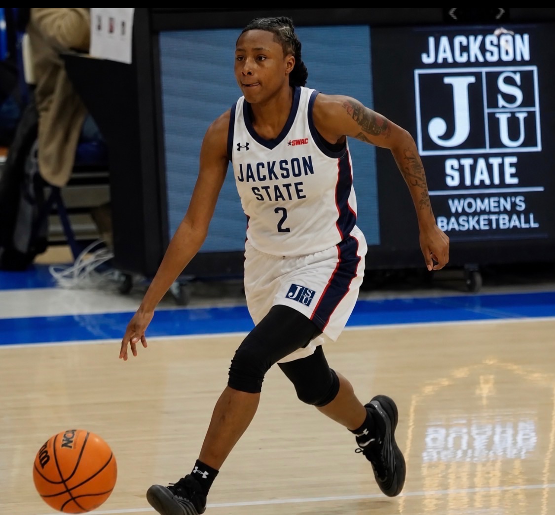 Jackson State guard driving to the basket during an HBCU women's basketball game